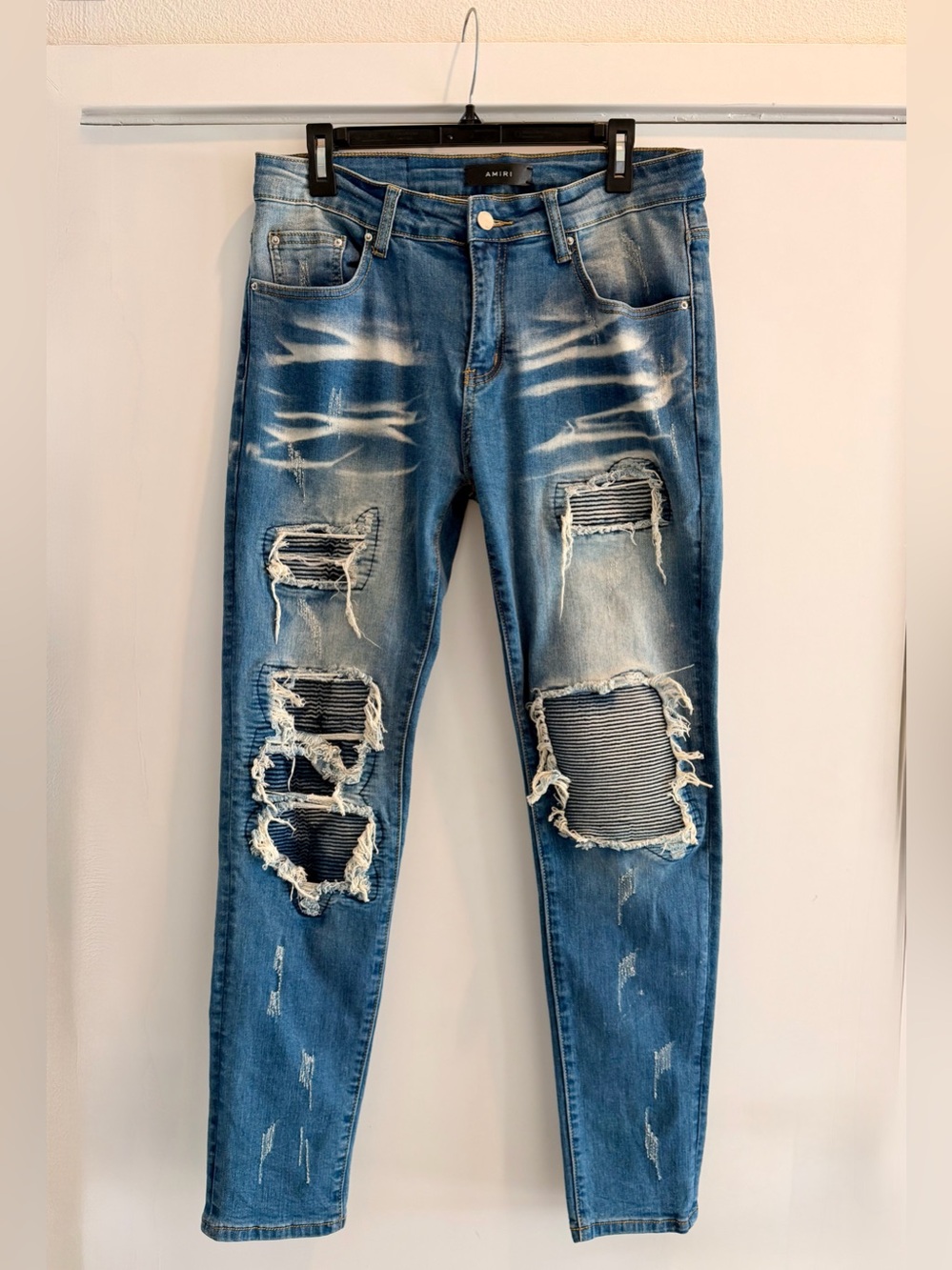 AMIRI Men's Blue Distressed Ribbed Patch Skinny Jeans. Size 32
